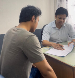 Best skin doctor performing detailed skin analysis using advanced diagnostic equipment during patient consultation